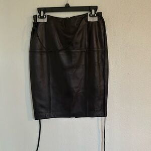 Black leather skirt. MIDI